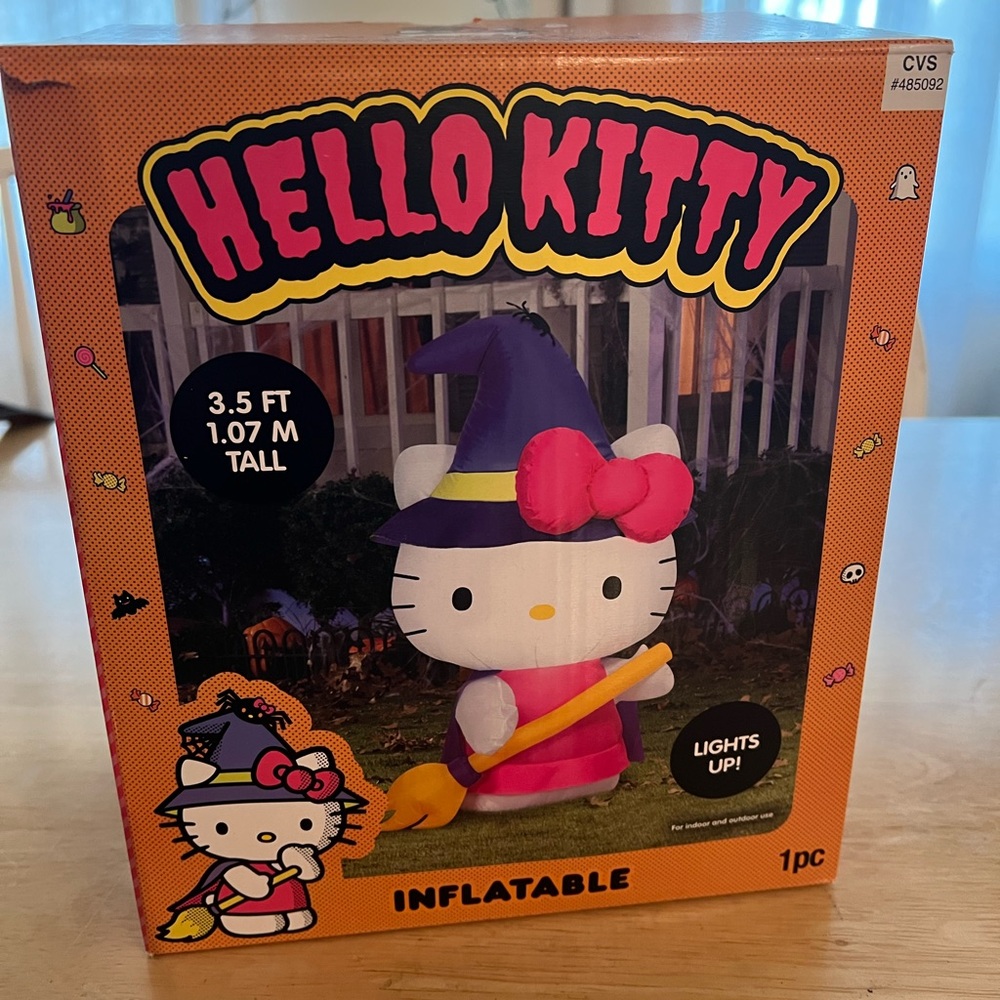 Hello Kitty Witch Inflatable with Purple Hat and Orange Broom